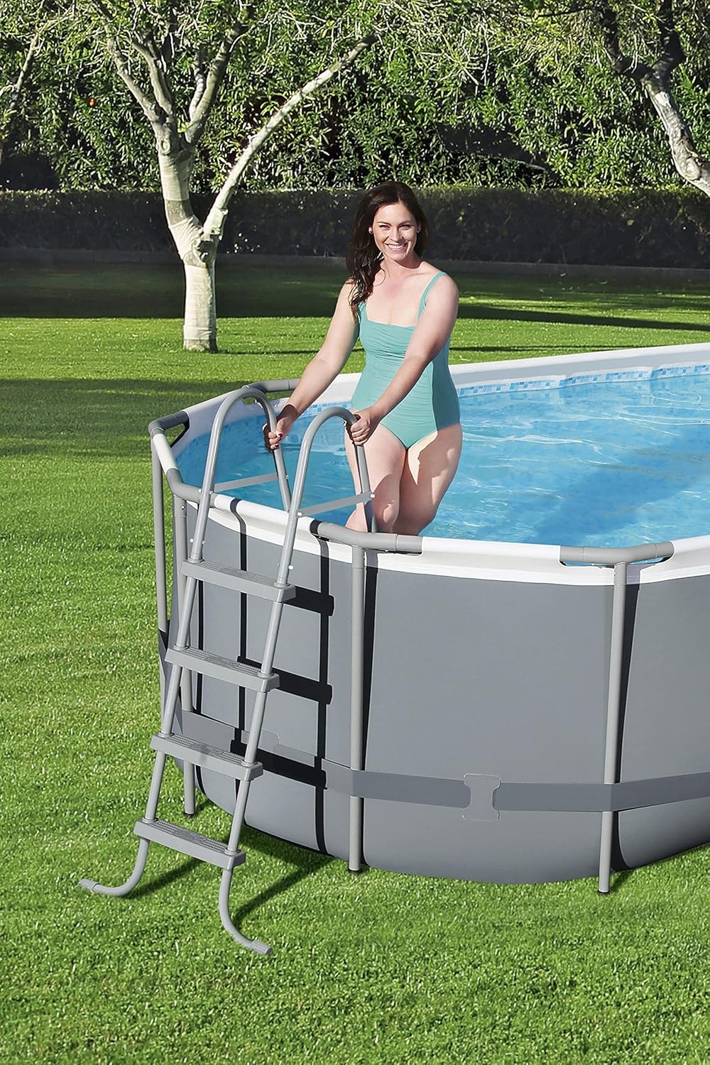 18' x 9' x 48 Outdoor Oval Frame Above Ground Swimming Pool Set with 1500 GPH Cartridge Filter Pump, Cover, & Ladder Y47465